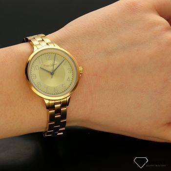 Zegarek damski BRUNO CALVANI złoty BC9596 DOUBLE GOLD. Zegarek damski w złotej kolorystyce z wyraźną tarczą. Zegarek damski wyposażony w mechanizm kwarcowy zasilany na baterię. Zegarek damski  (1).jpg